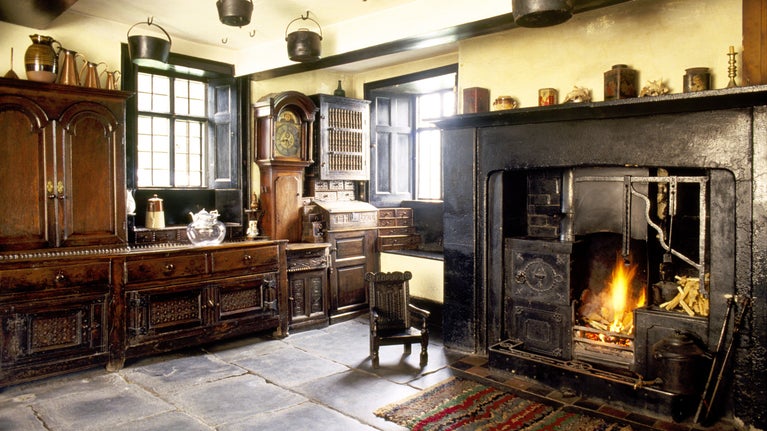 The fire is lit in the kitchen at Townend, Lake District